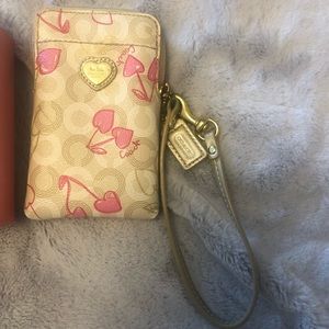 Coach NWT cherry wristlet